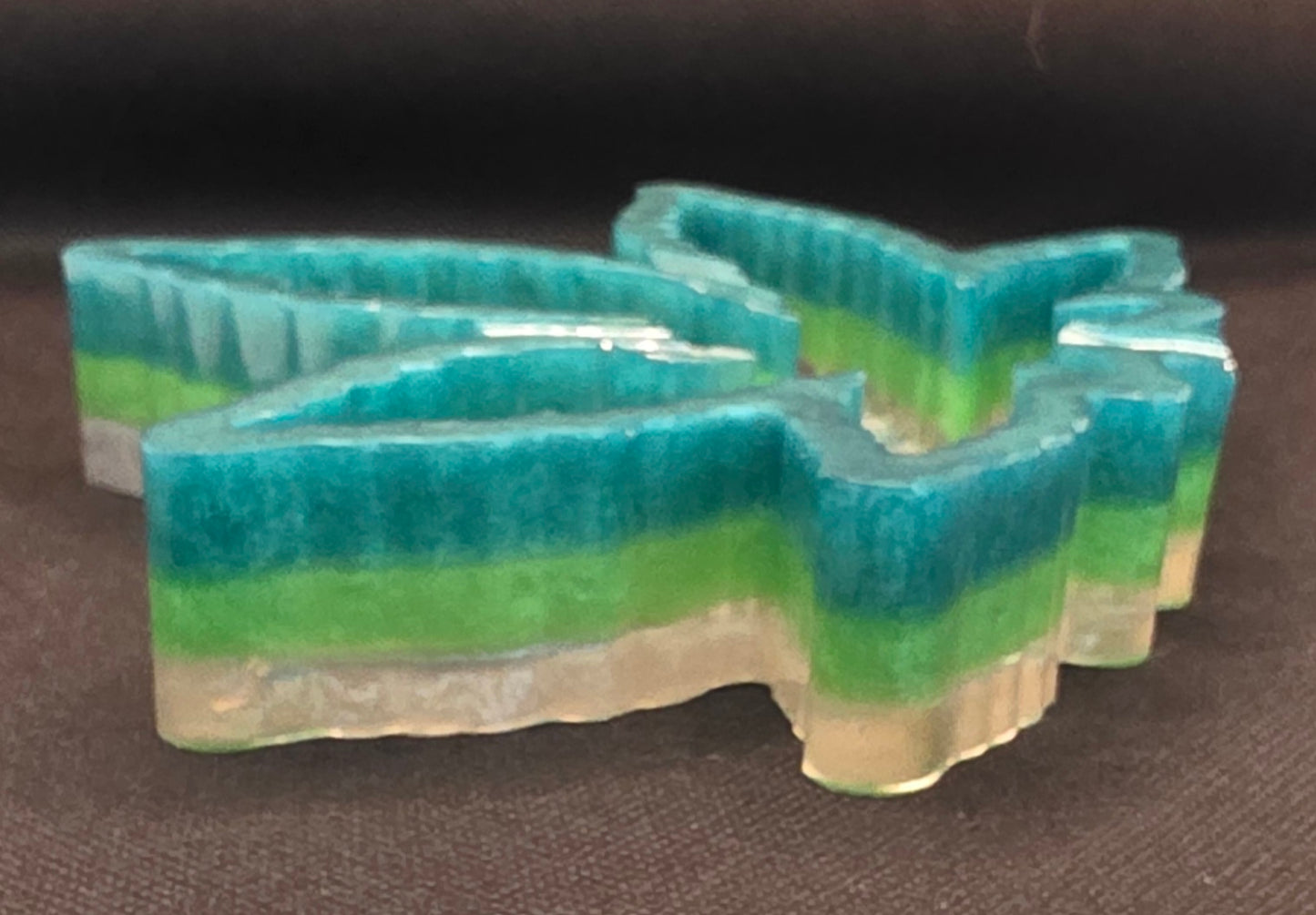 Dark green, grass green, with silver bottom