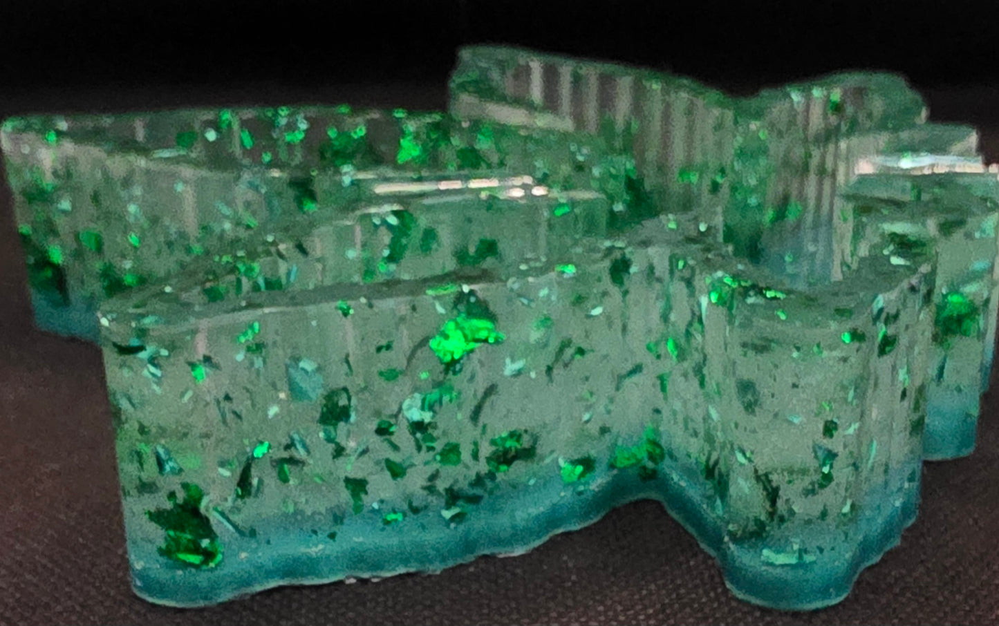 Clear with green foil and green bottom