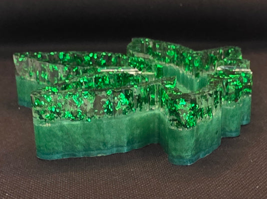 Clear with dark green foil, light green bottom