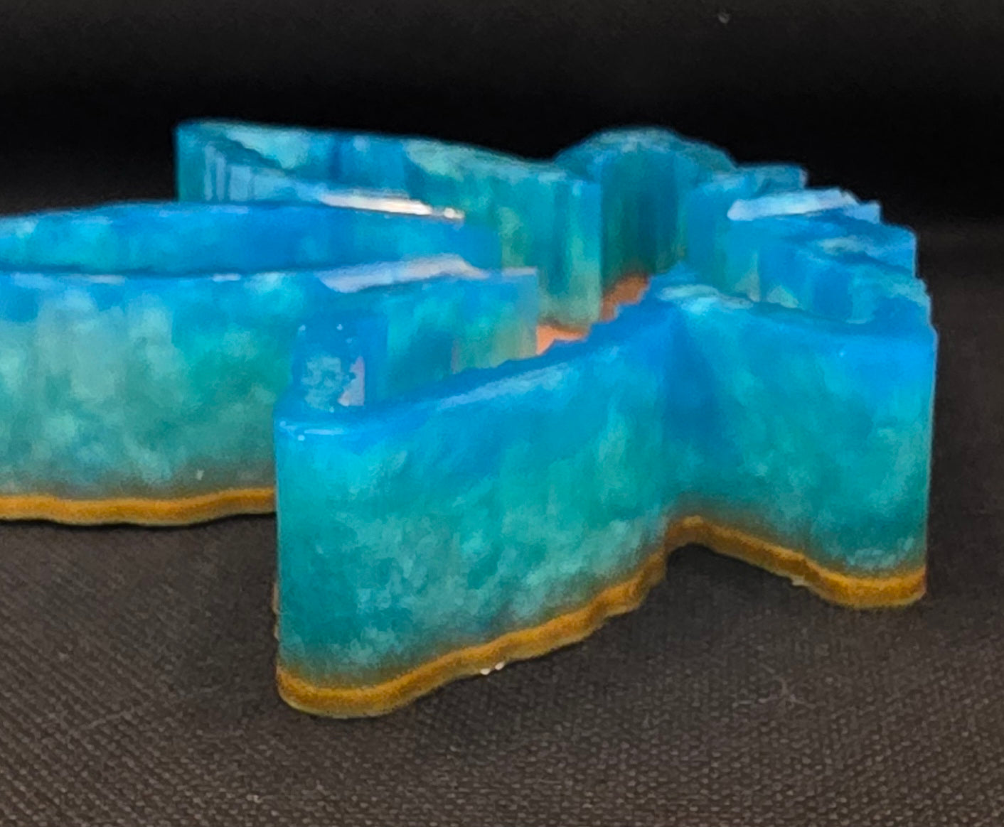 Teal and blue with a copper bottom