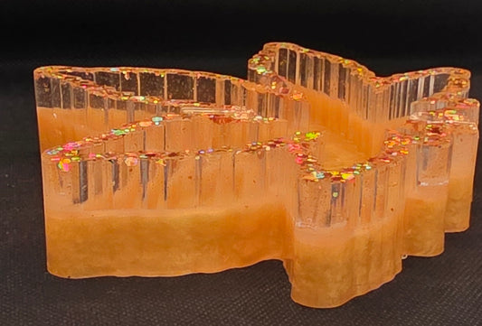 Clear with gold glitter and gold bottom